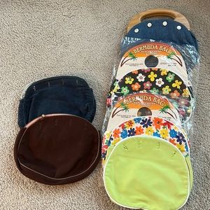 Vintage Oak-Handled Bermuda Bag with six interchangeable color “bodies.”